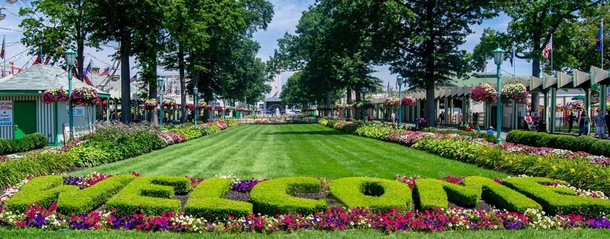 employee with red t-shirt smiling