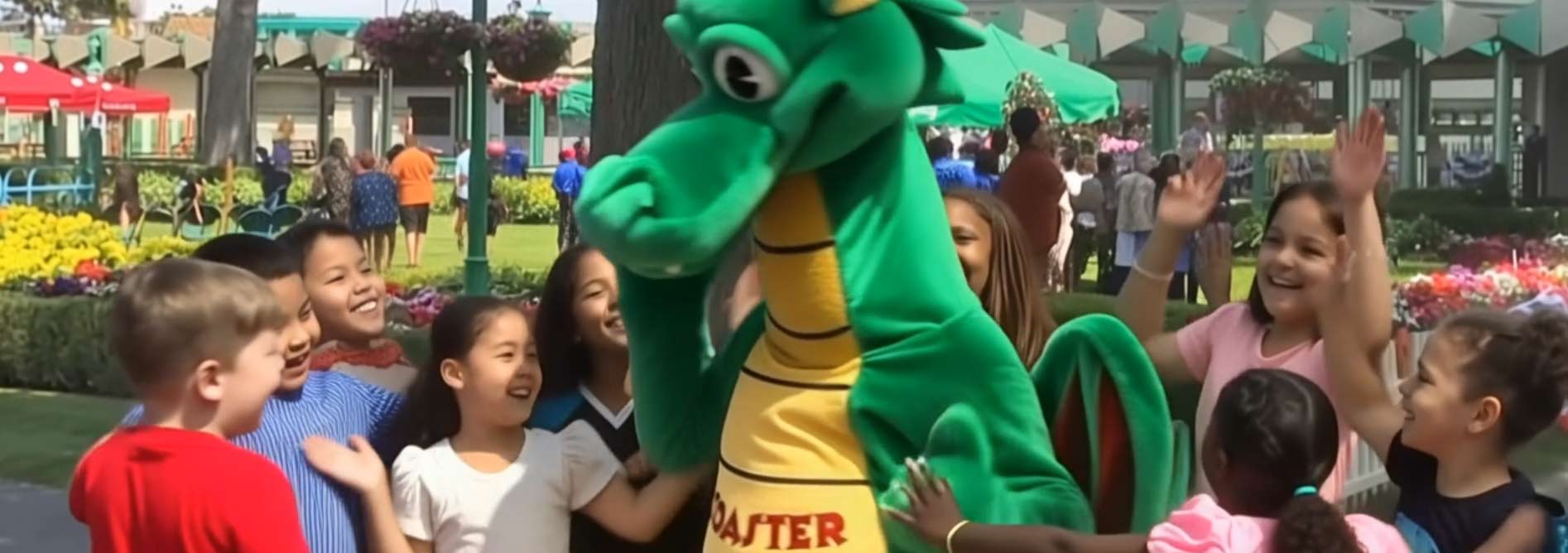 image of coaster greeting a group of children